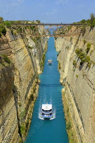 Corinth Canal, Greece. The Corinth Canal is a sluiceless shipping canal in Greece, connecting the Saronic Gulf of the Aegean and the Gulf of Corinth of the Ionian Sea