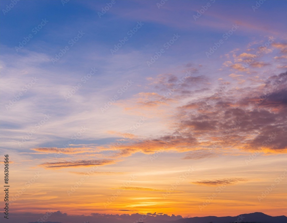 Background of colorful sky concept Dramatic sunset with twilight color sky and clouds.