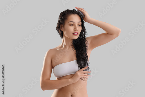 Young Asian woman with wet ...