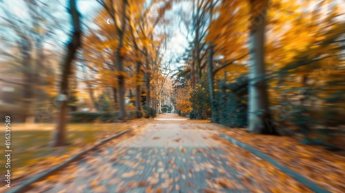 Autumn park with intentional motion blur creating a natural bokeh background photo