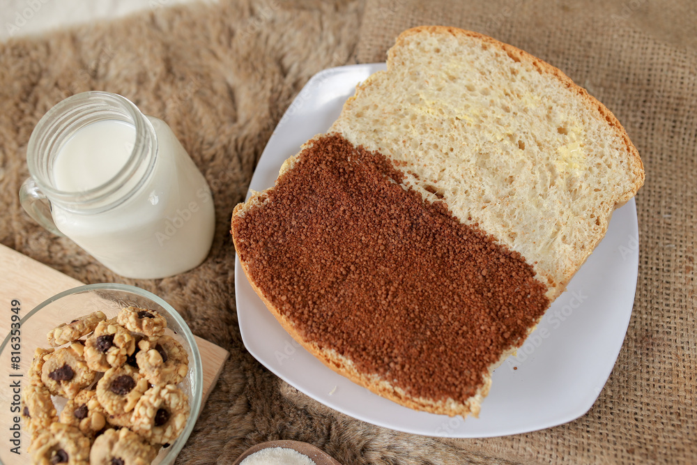 Bread with choco and butter on a plate for breakfast Bread with choco and butter on a plate for breakfast