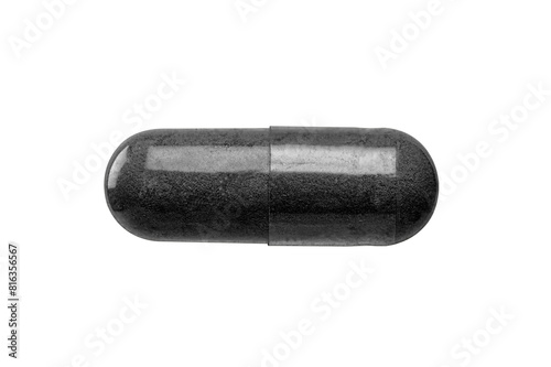 Charcoal or carbon capsule isolated on white background.