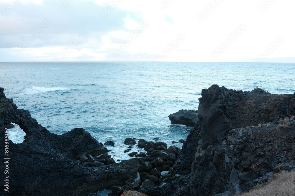 a view of the coast of the sea a view of the coast of the sea