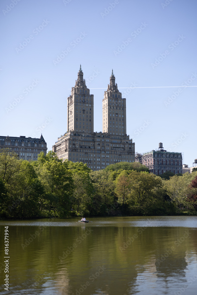 The Eldorado building central park lake with boats The Eldorado building central park lake with boats