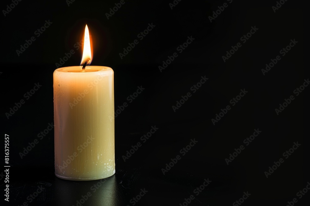 Burning candle on a dark background Burning candle on a dark background