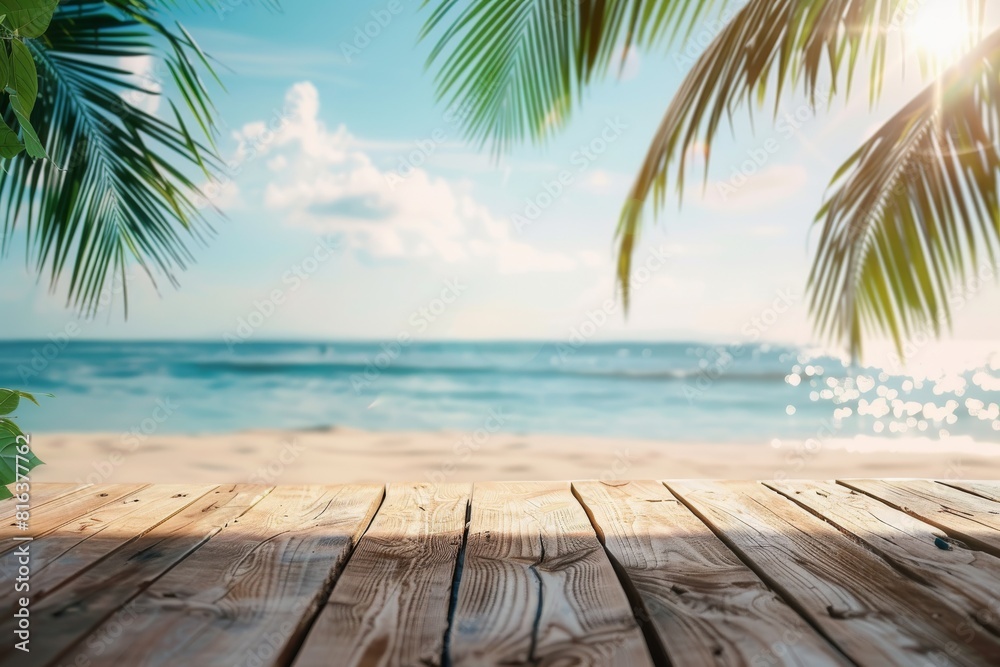 Sunny tropical beach landscape with palm trees and a wooden foreground Sunny tropical beach landscape with palm trees and a wooden foreground