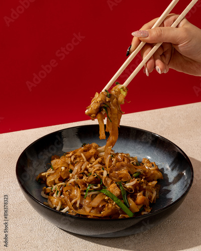 Asian fried kwetiaw served with XO sauce photo