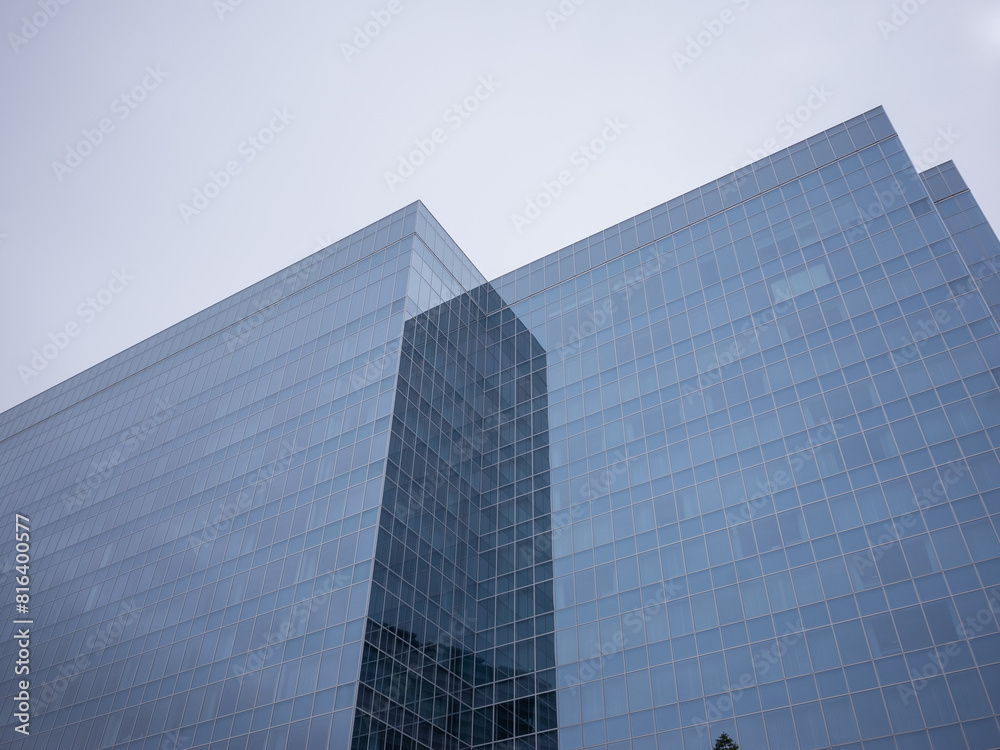 glass office buildings and cloudy sky glass office buildings and cloudy sky