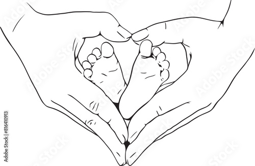baby feet held in heart shaped hands