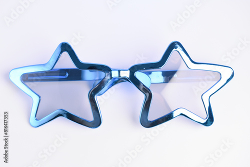 blue star shape of glasses on white background photo