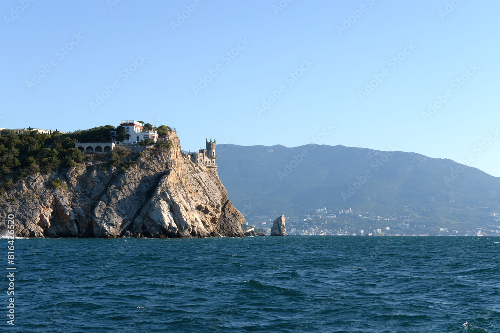 Fototapeta premium Castle Swallow's Nest on a rock at Black Sea, Crimea. It is a symbol and tourist attraction of Crimea