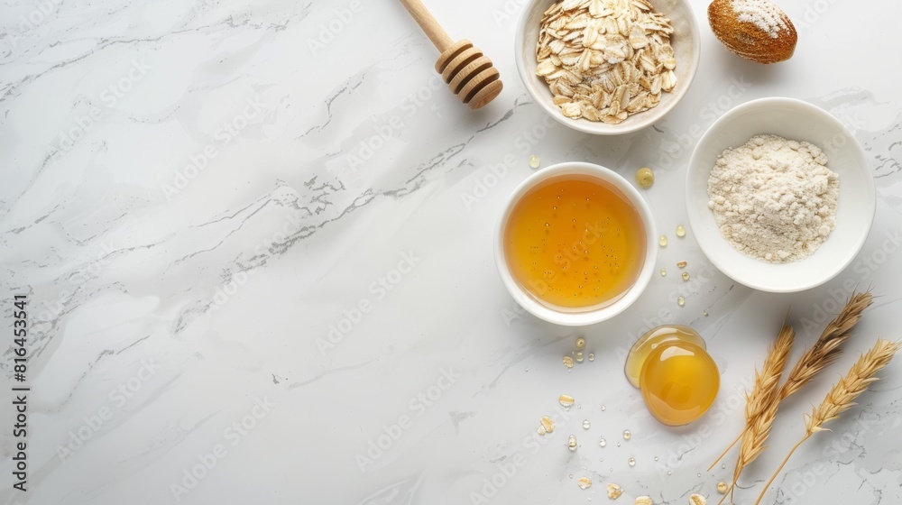 Artistic top shot of natural ingredients for a detox face mask, including honey and oatmeal, on a luxurious marble surface, isolated for clarity Artistic top shot of natural ingredients for a detox face mask, including honey and oatmeal, on a luxurious marble surface, isolated for clarity