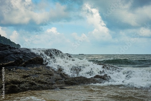 Fototapeta Naklejka Na Ścianę i Meble -  Image of a wave crashing on the rock