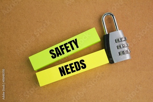 key and colored paper with the word Safety needs. the concept of necessary safety requirements