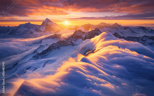 Beautiful mountain peaks in the clouds  a panoramic view of snowcapped mountains with a golden sunset light