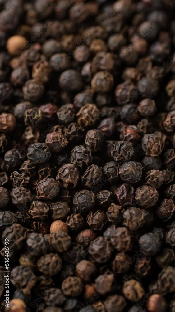 Heap of Peppercorn top view rotation. Flavorful and aromatic black pepper Heap of Peppercorn top view rotation. Flavorful and aromatic black pepper