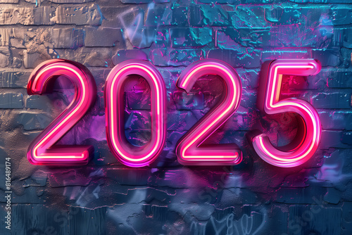 Neon sign displaying 2025 on brick wall photo
