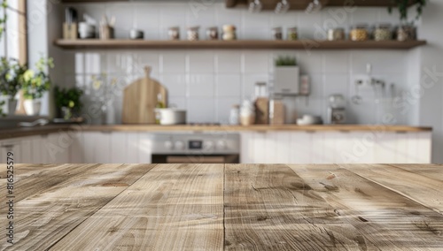 Empty beautiful wood table top on blur kitchen interior background in modern home.