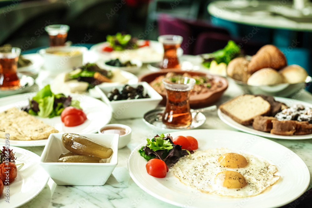 Assorted Plates of Delicious Food on a Table Assorted Plates of Delicious Food on a Table