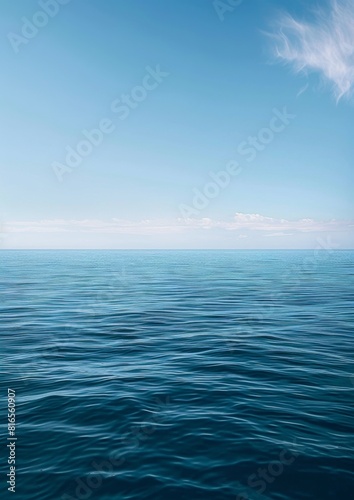 A serene ocean horizon with the sky blending into calm waters