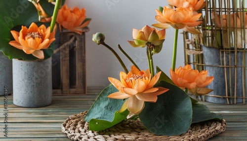 Elegancia Sobria: Ikebana de Loto Naranja en Arreglo Floral photo