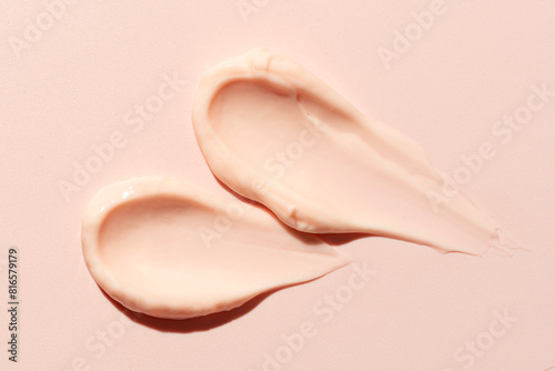 Pink peach cosmetic cream sample