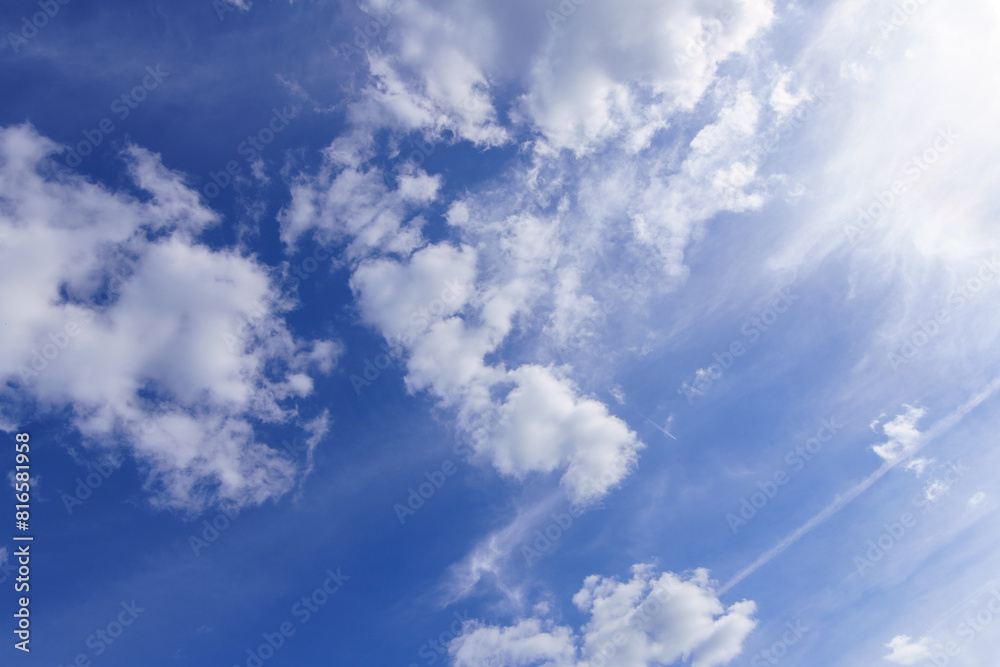 Blue sky with white clouds in the background Blue sky with white clouds in the background