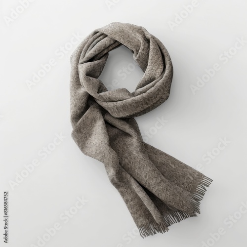 Gray scarf laid on a plain white backdrop