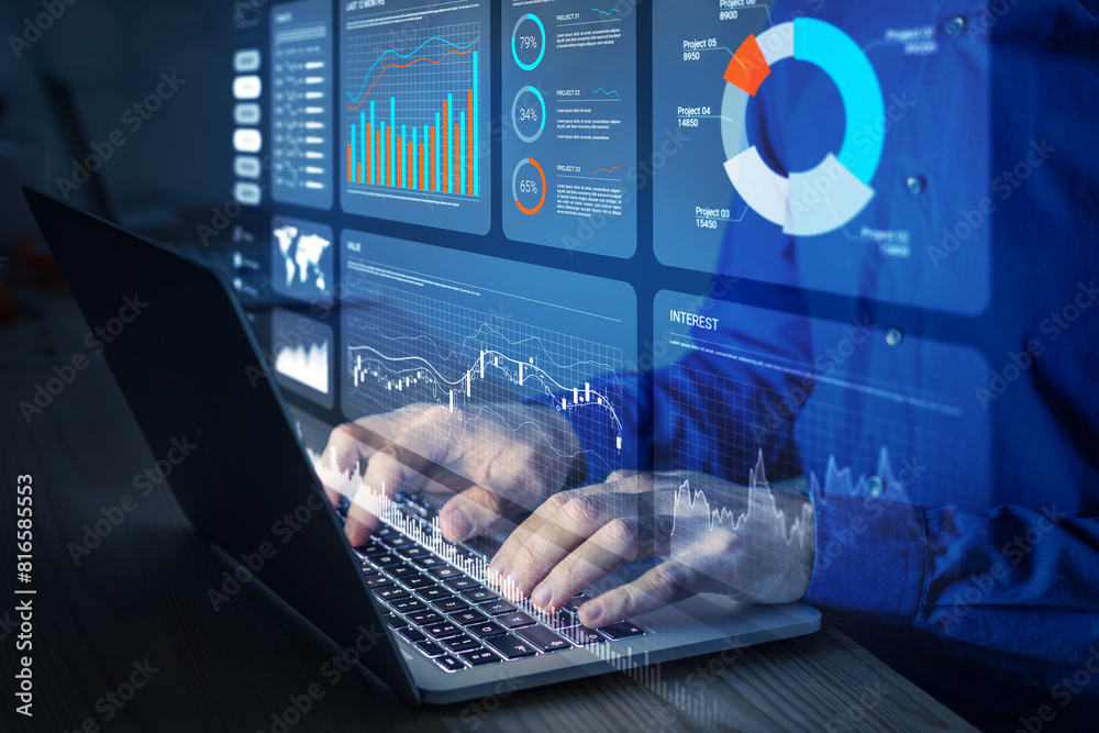 Analyst working with Financial Report and Business Analytics Dashboard on laptop computer to analyze Financial Data with KPI and Metrics. Investment, Operations, Sales, Corporate Finance, Strategy.