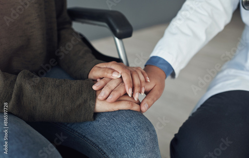 Doctor, patient and holding hands for medical support in hospital office with closeup, empathy and kindness. Professional, expert and woman with sympathy for healthcare results, diagnosis and health