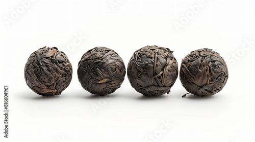 Four of tasty puer tea isolated on white photo