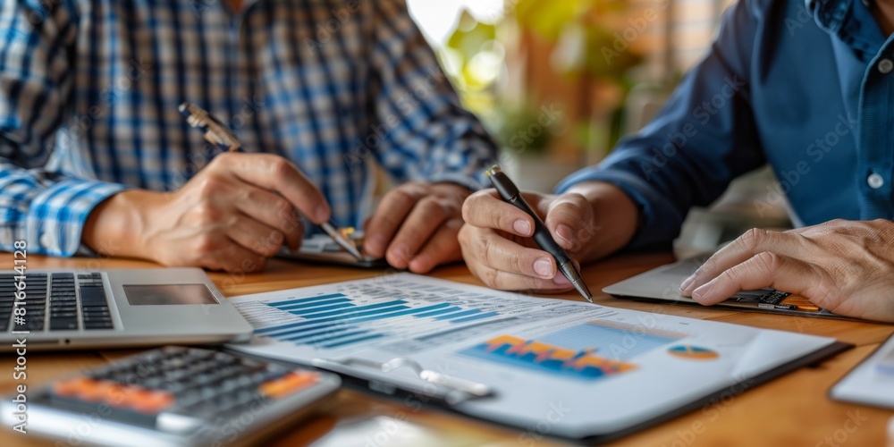 A financial advisor explaining investment options to a client A financial advisor explaining investment options to a client