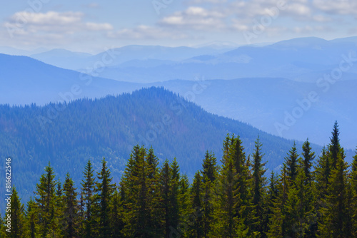 mountain valley in blue mist