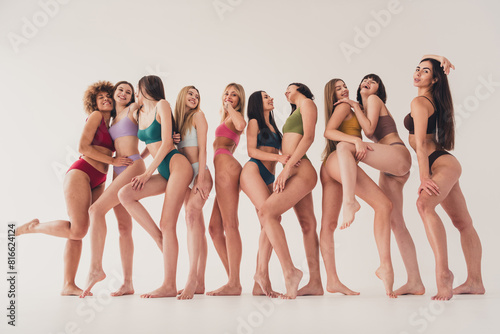 No retouch photo of group girls touch skin after depilation procedure in lingerie isolated on white color background