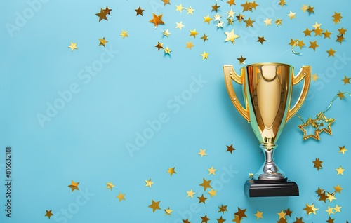 A golden trophy on a teal background, surrounded by sparkling stars. Symbolizes achievement, victory, and excellence. A perfect image for celebrating success, honoring winners, or motivating performe