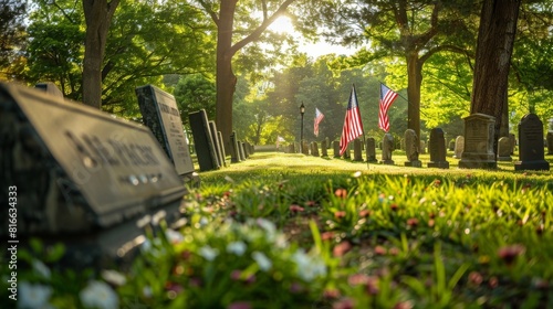Tombstones marked by US flags on Memorial Day.