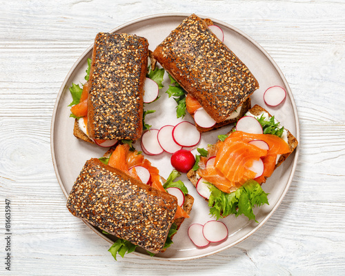 smoked salmon sandwiches on rye bread rolls