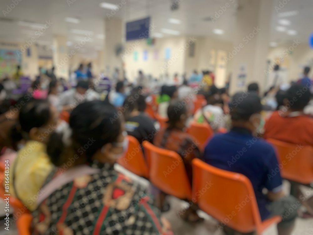 Blurry image of many patients coming to use the hospital's services and waiting to see a doctor. Blurry image of many patients coming to use the hospital's services and waiting to see a doctor.
