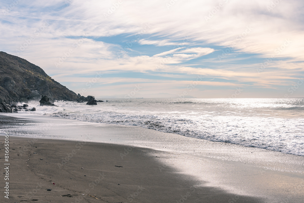Ocean beach with a blue sky on the background Ocean beach with a blue sky on the background