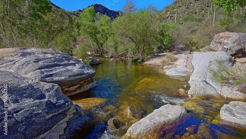 Early morning springtime view of Sabino Creek's golden waters in Sabino Canyon, Arizona photo