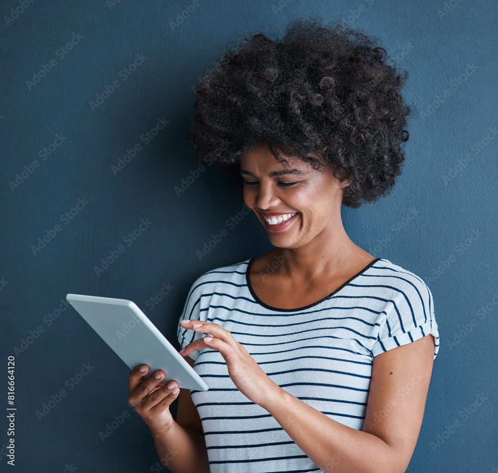 Studio background, black woman and digital tablet for reading, connect and social media with smile. Mockup, girl and technology for networking, scrolling and typing or chat on online application Studio background, black woman and digital tablet for reading, connect and social media with smile. Mockup, girl and technology for networking, scrolling and typing or chat on online application