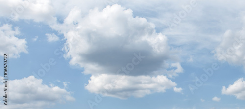Rounded cloud in the center on the summer sky