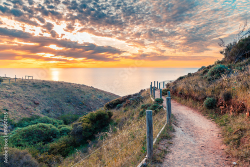 Hallett Cove public coastal walking trail with a sea view at sunset, South Australia photo