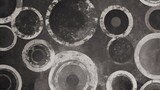 Black abstract background with white circle rings in faded distressed vintage grunge texture design