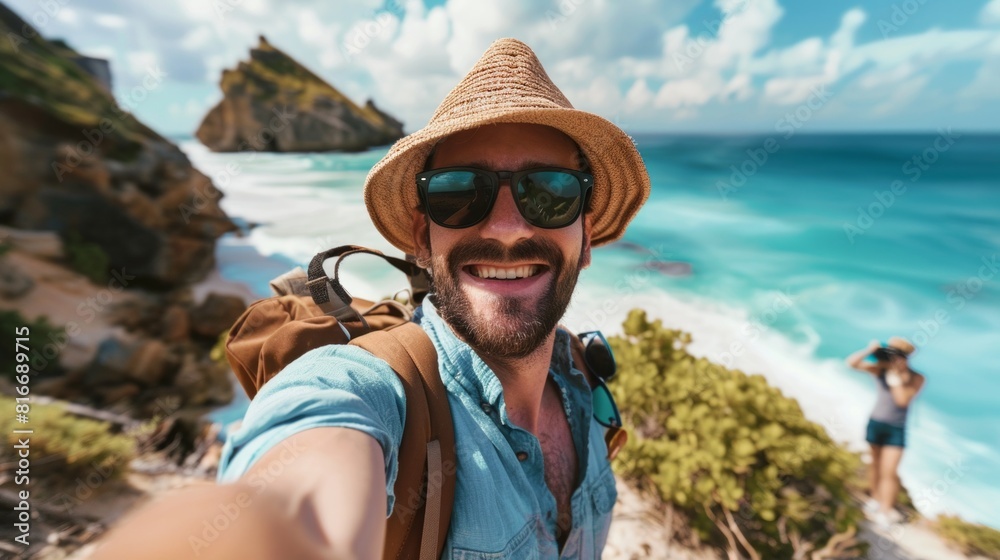Happy man backpacker traveler take a selfie photo on amazing ocean coast Happy man backpacker traveler take a selfie photo on amazing ocean coast