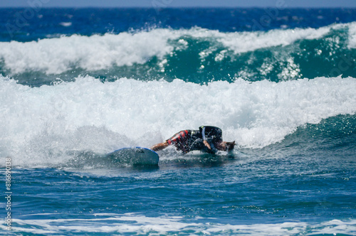 Photography surfing on the waves in the ocean