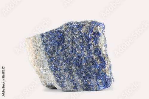 Lapis lazuli, or lapis for short, is a deep-blue metamorphic rock used as a semi-precious stone photo