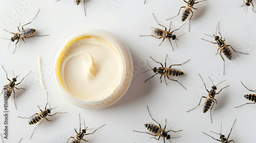 Mosquito repellent cream on white background photo
