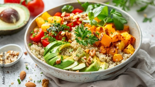 A colorful and nutritious lunch bowl filled with quinoa, roasted vegetables, avocado, and a sprinkle of nuts, presented in a minimalist, clean kitchen setting