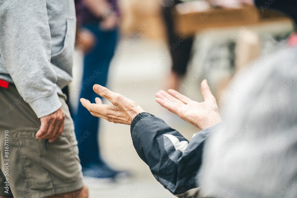 a person giving another person high five in a parking lot a person giving another person high five in a parking lot